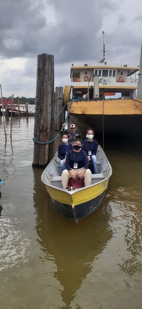 The field team travelling by boat