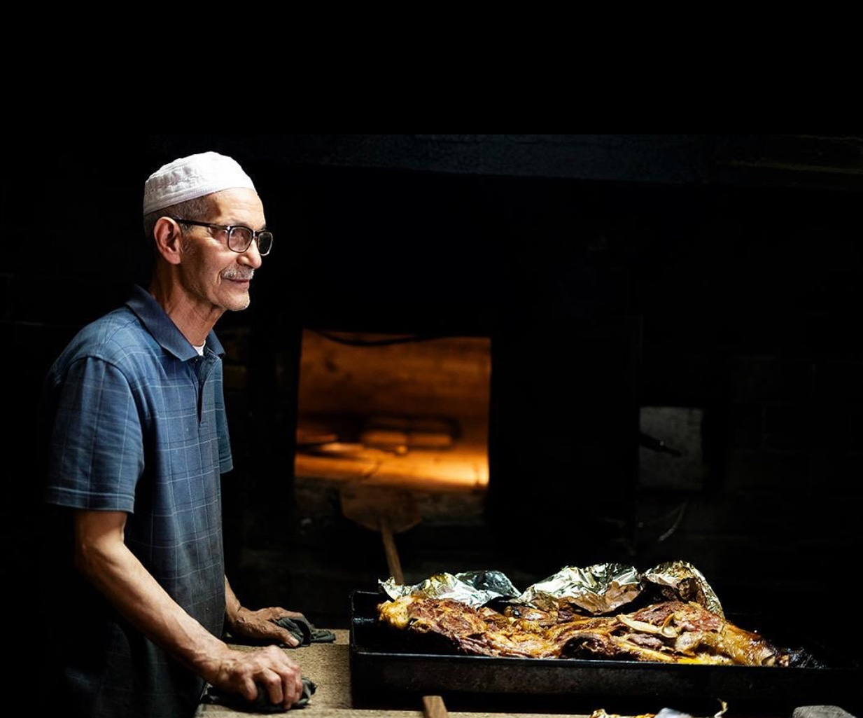 Baker by wood-fired oven